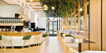 a room with tables and chairs