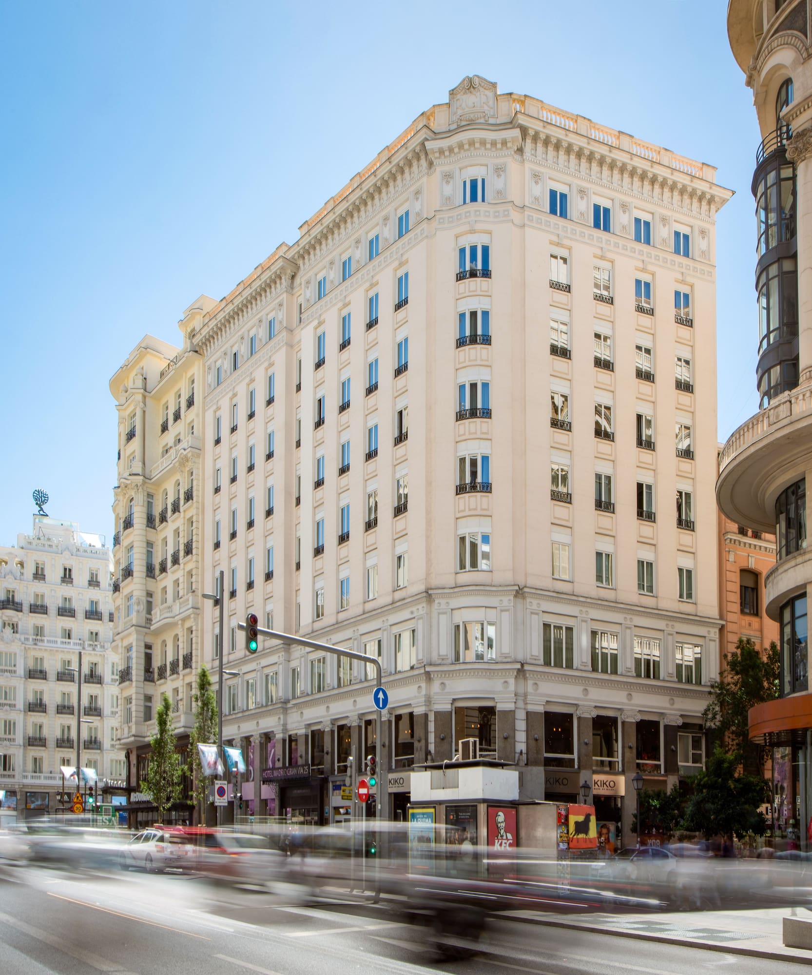 a street with cars and buildings