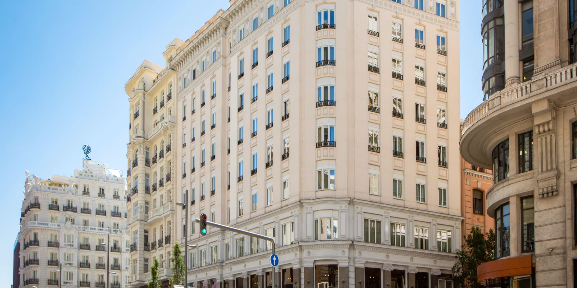 a street with cars and buildings