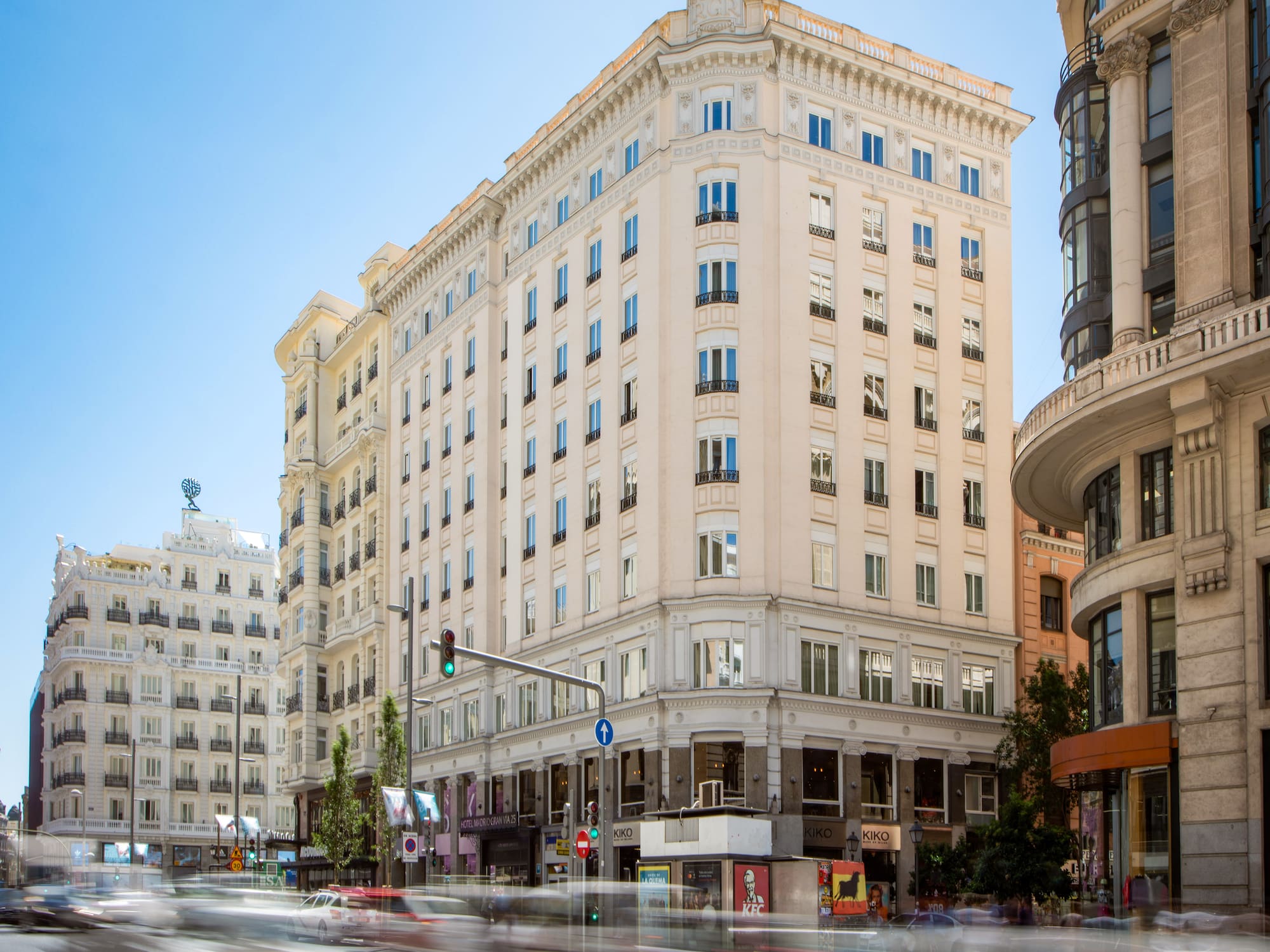 a street with cars and buildings