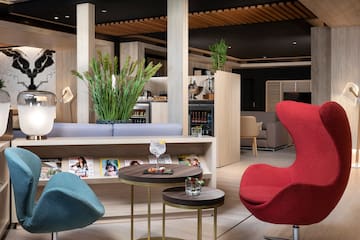 a room with a table and chairs