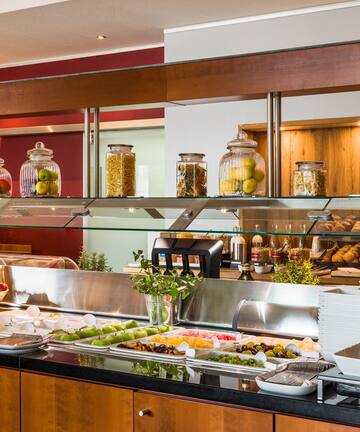 a buffet with food on the counter