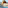 Rooftop infinity pool, lounge chairs, and historic tiled dome in a city setting.