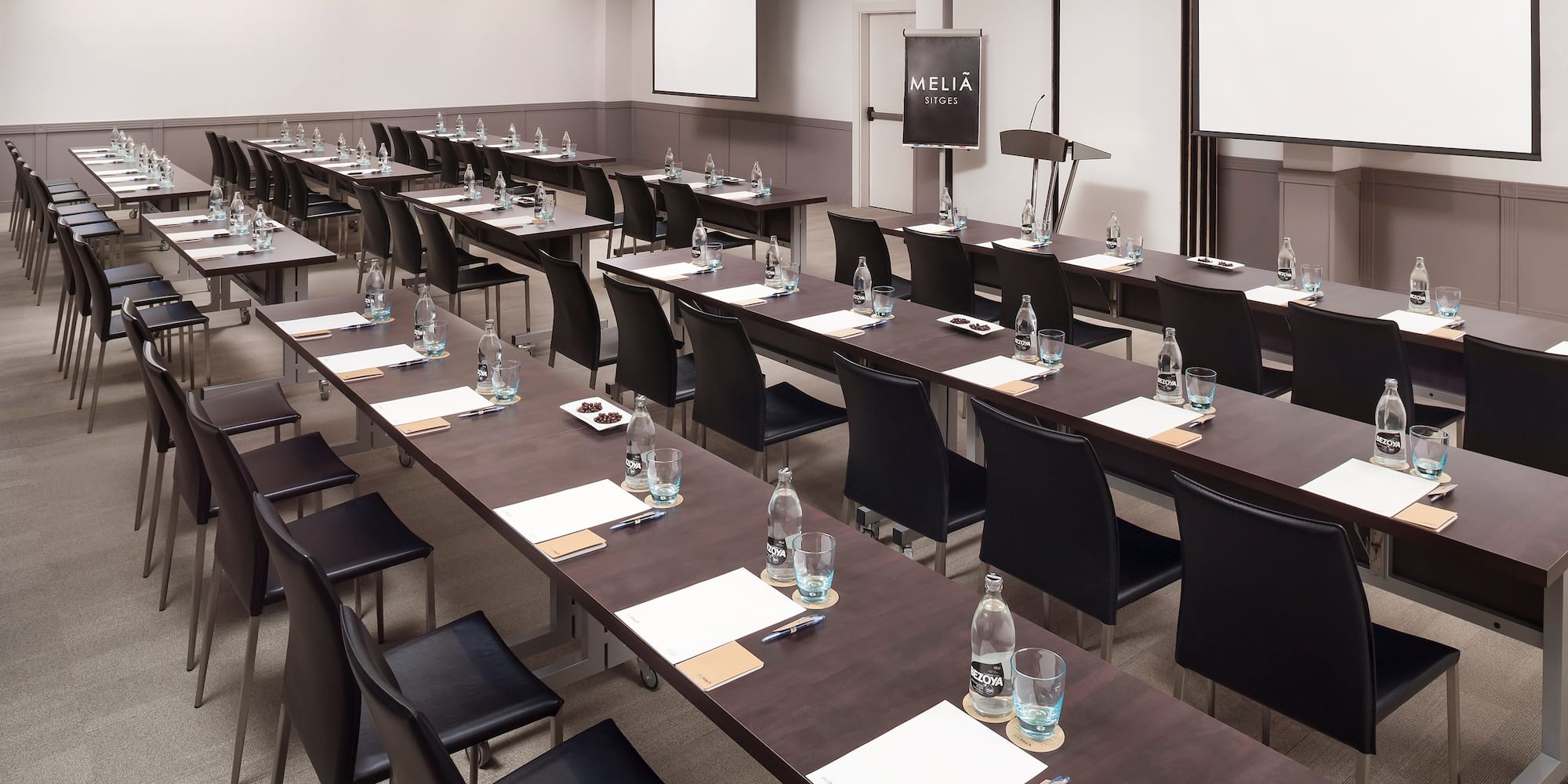 a room with tables and chairs