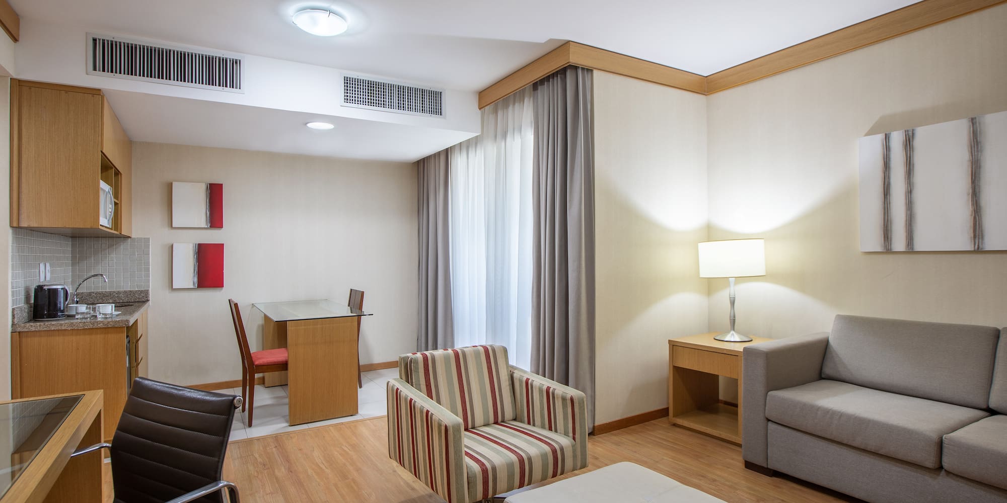 a room with a table and chairs