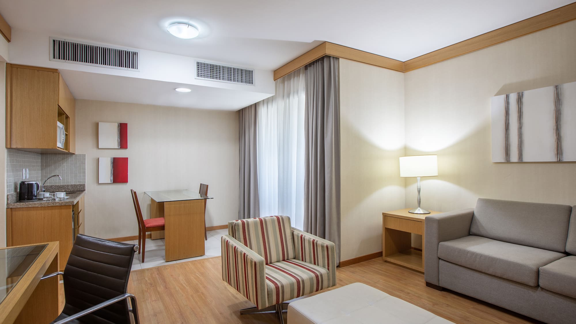 a room with a table and chairs