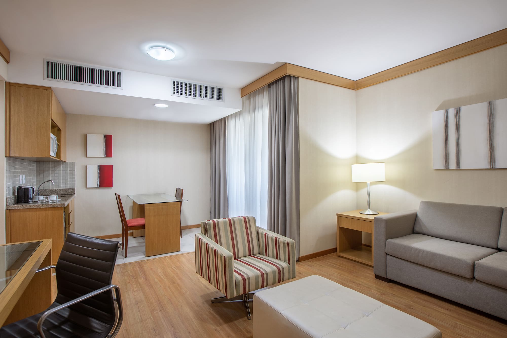 a room with a table and chairs