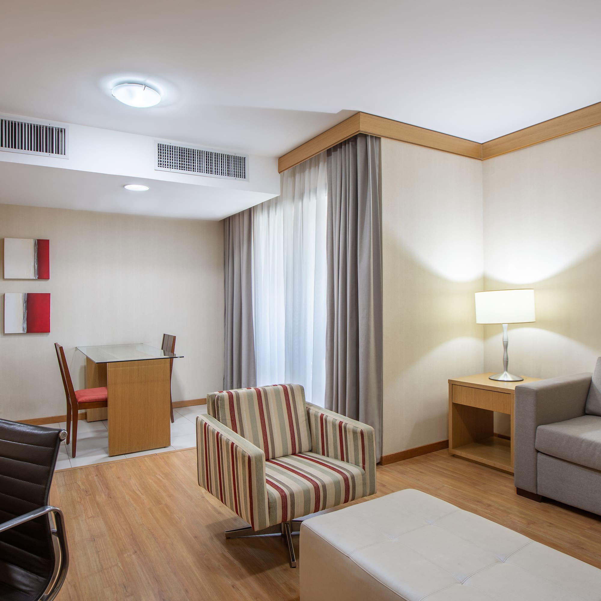 a room with a table and chairs