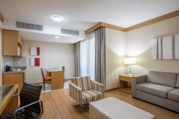 a room with a table and chairs