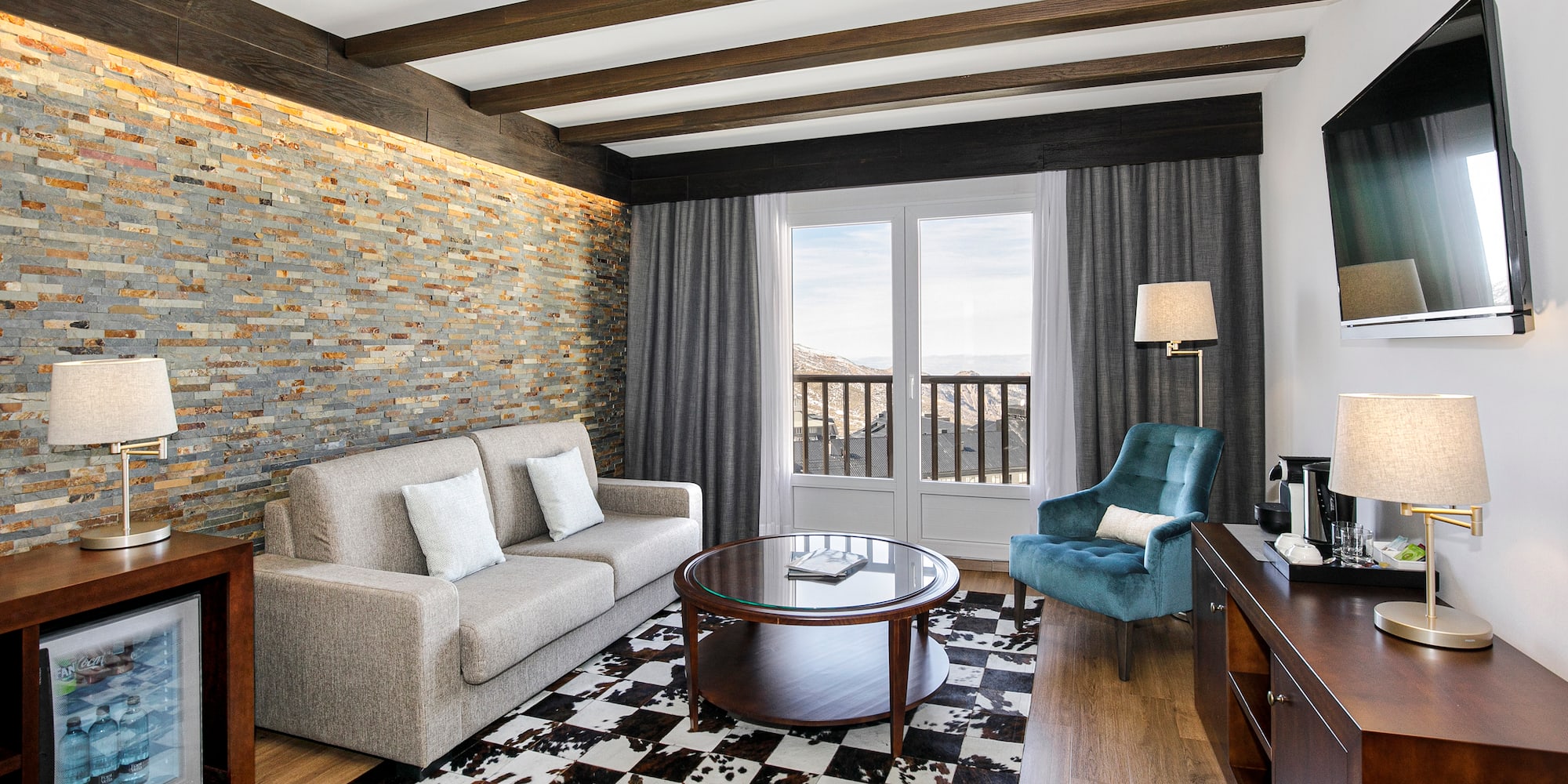 a living room with a couch and a table