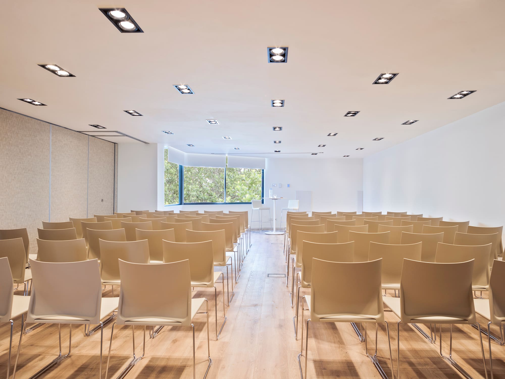 a room with rows of chairs