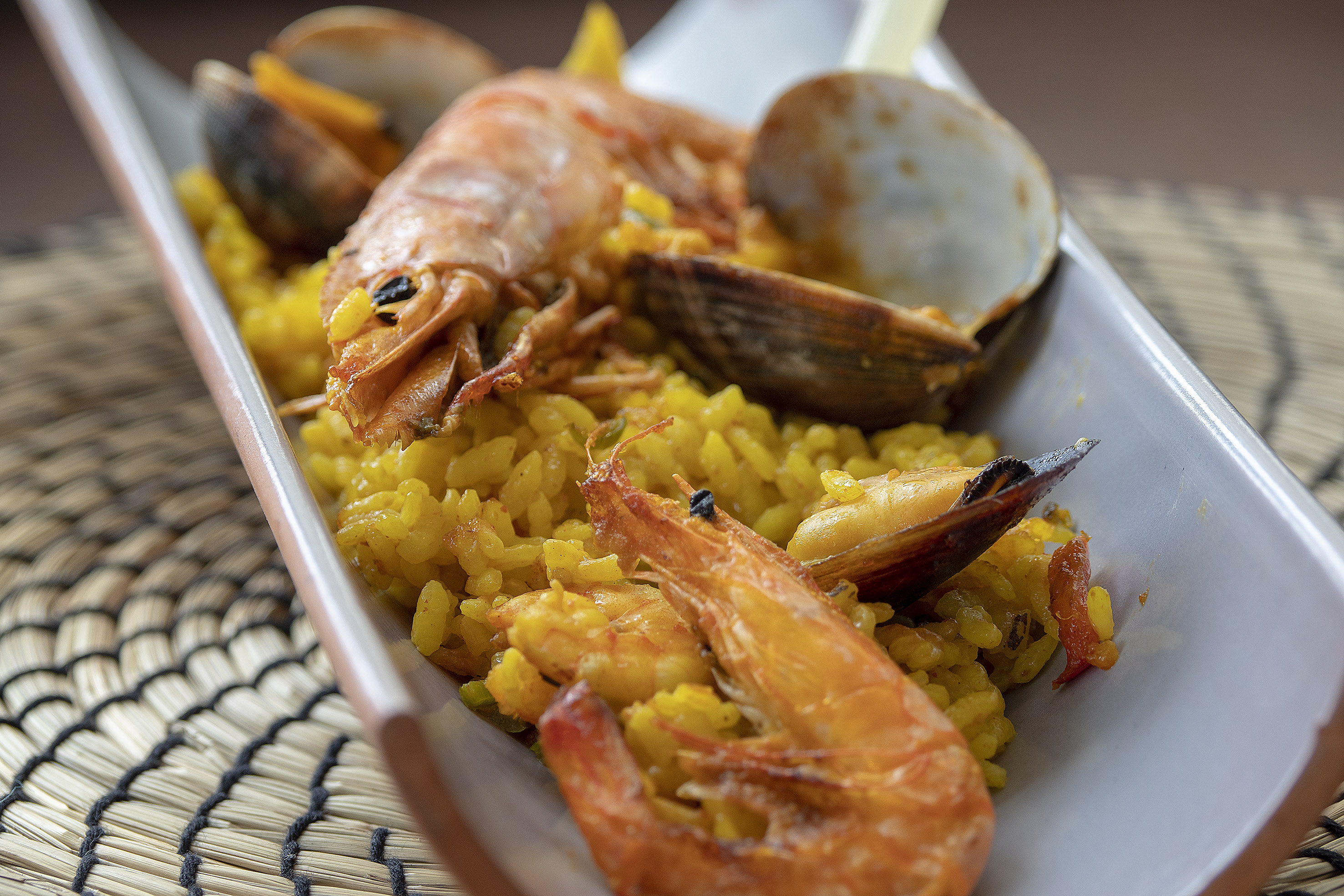Seafood paella with shrimp, shellfish, and saffron rice.