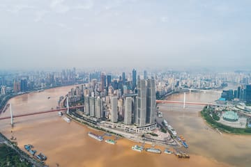 a city with a river and a bridge