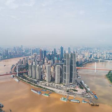 a city with a river and a bridge
