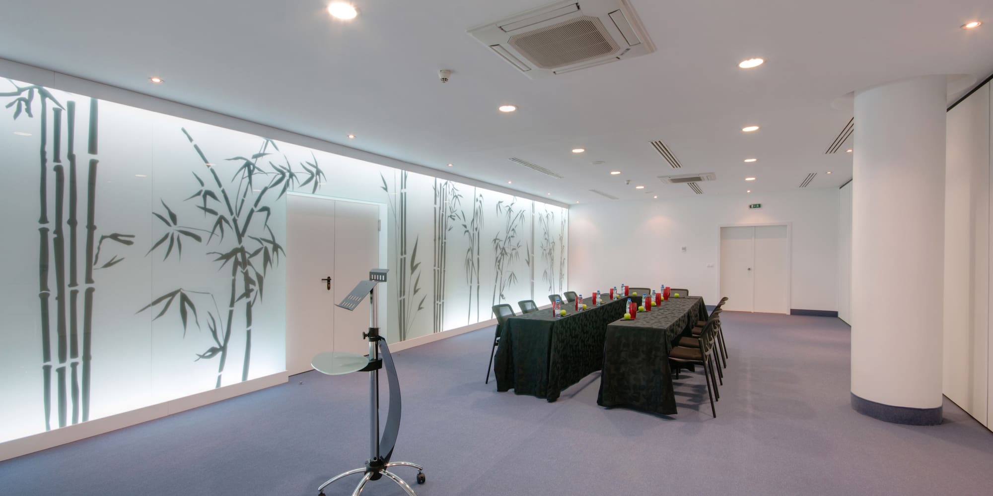 a room with tables and chairs