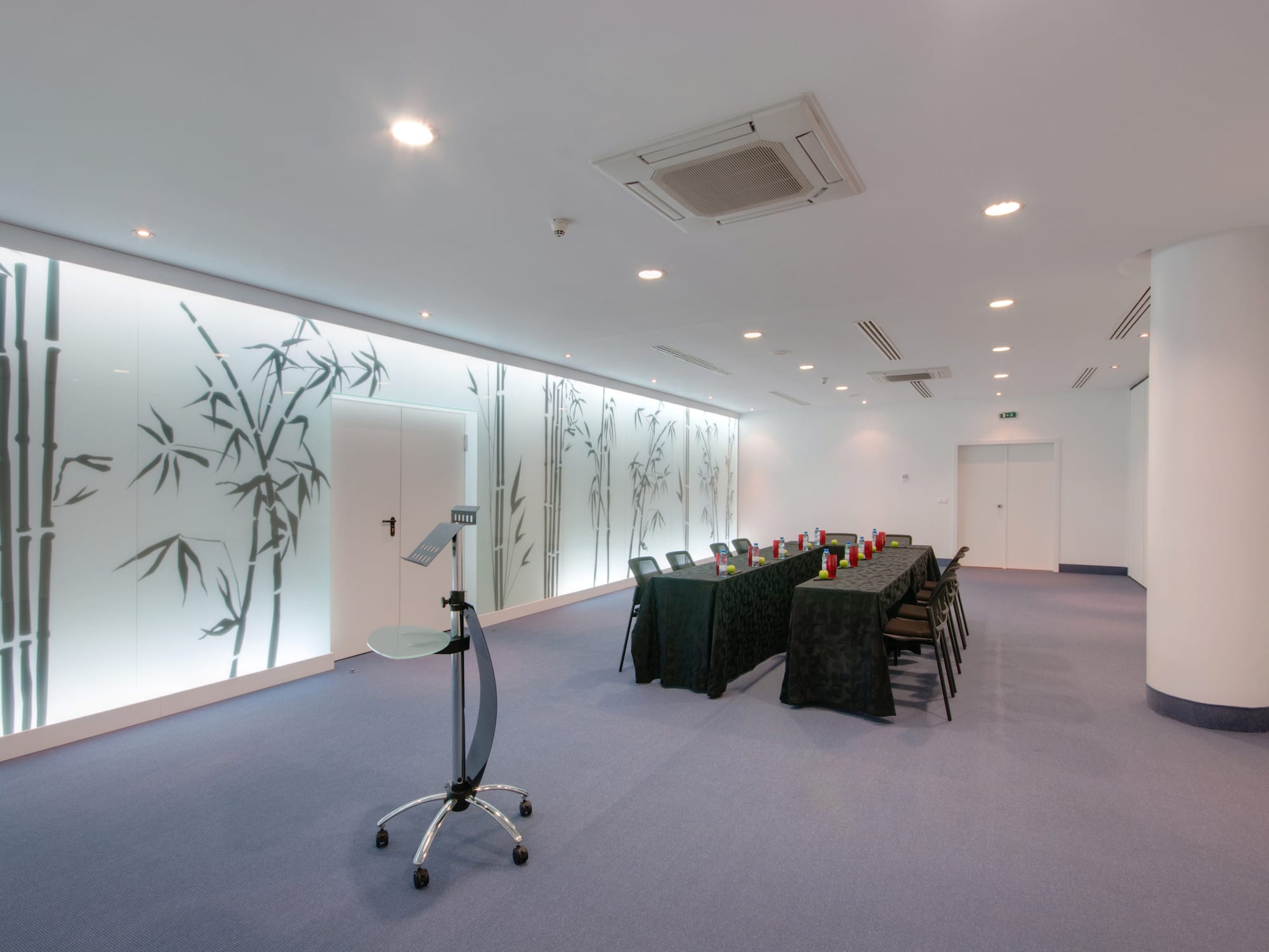 a room with tables and chairs