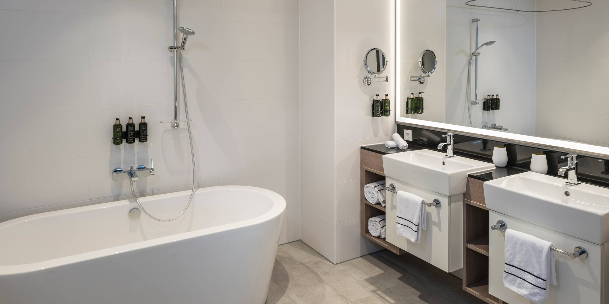 a bathroom with a tub and sink