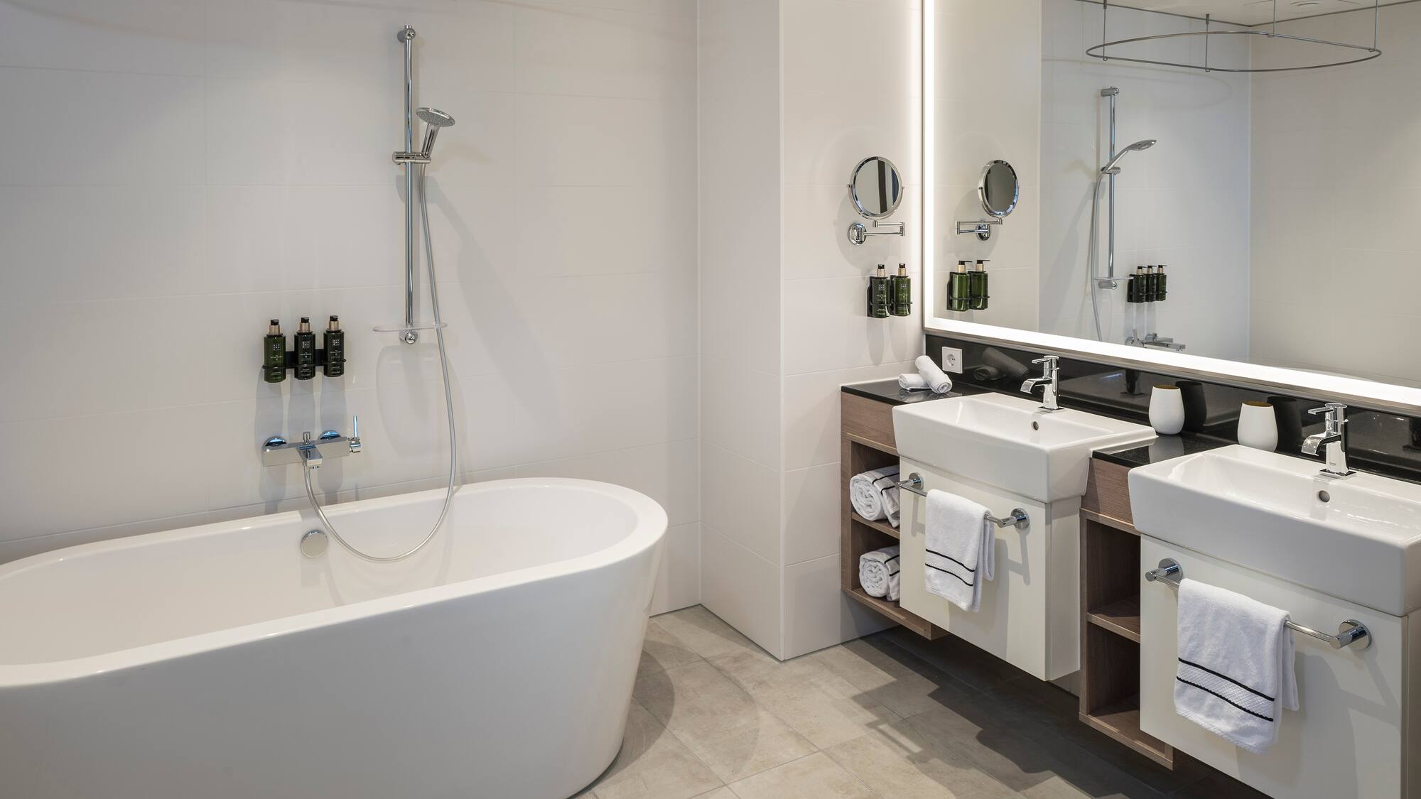 a bathroom with a tub and sink