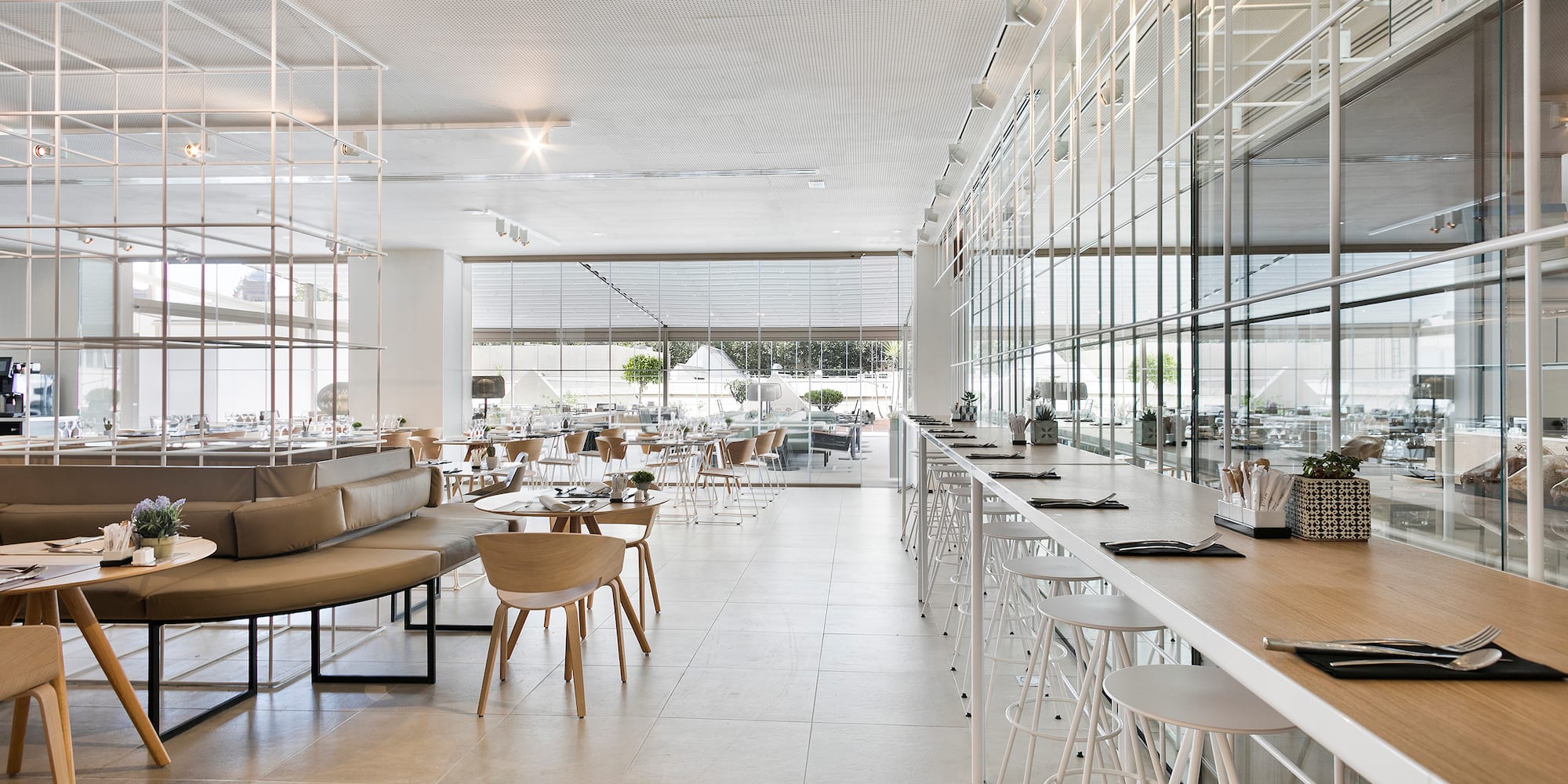 a restaurant with tables and chairs