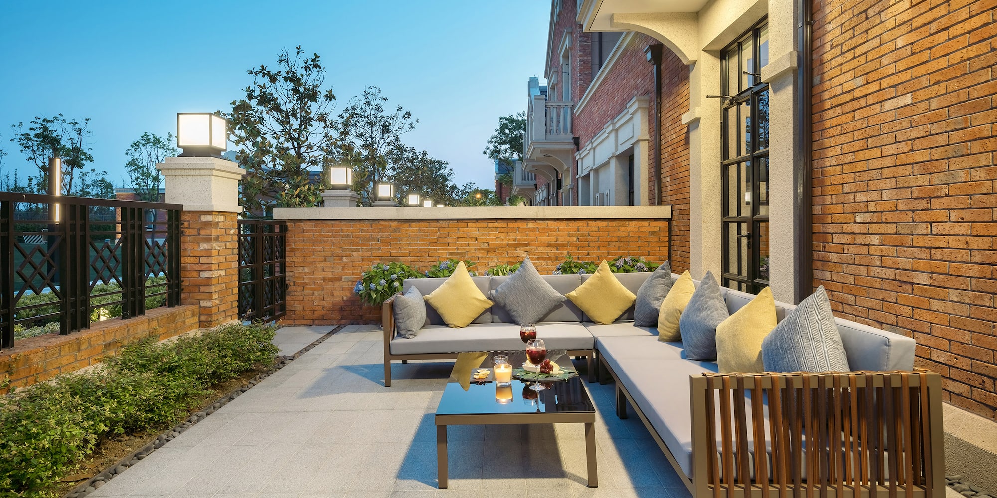 a patio with a couch and a table