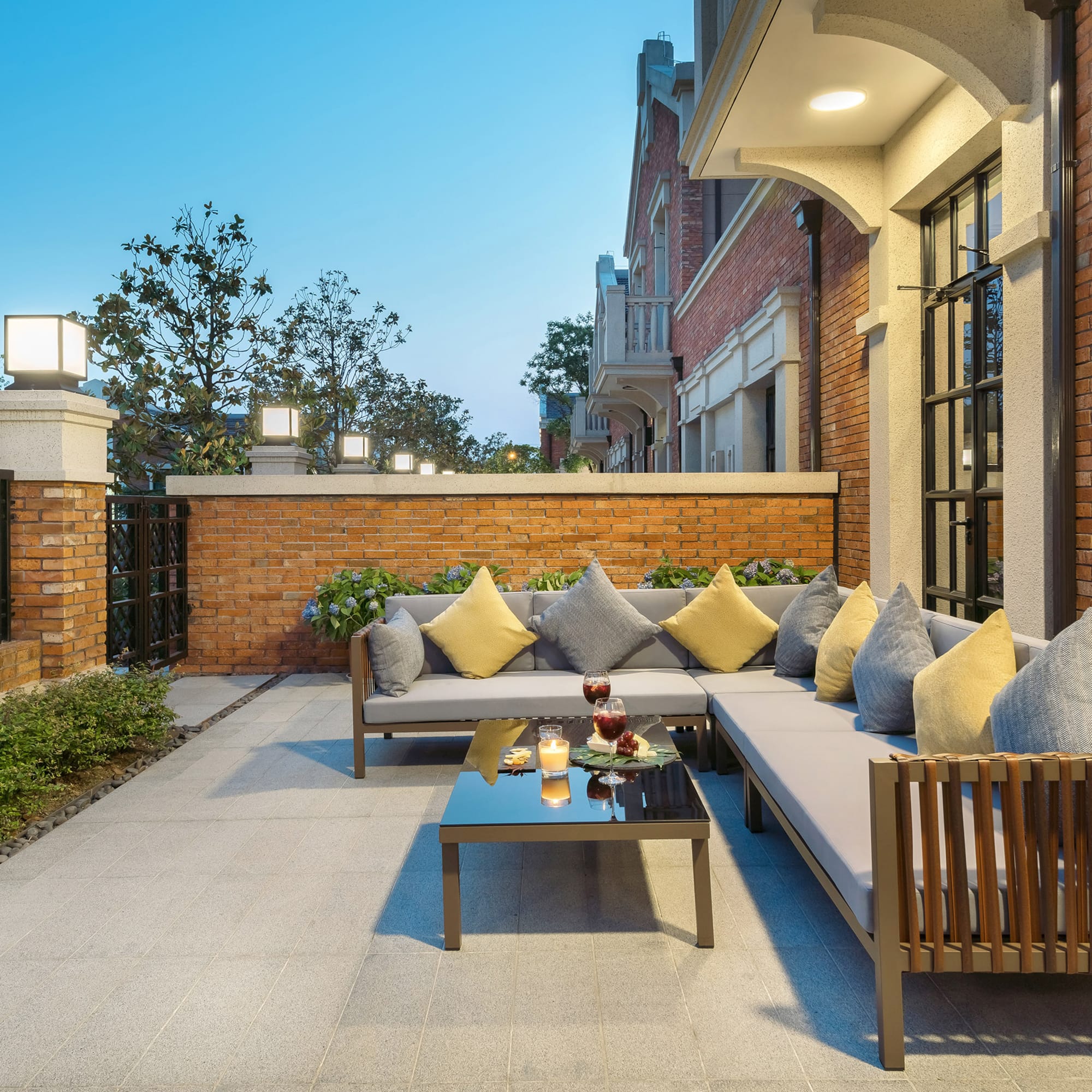 a patio with a couch and a table
