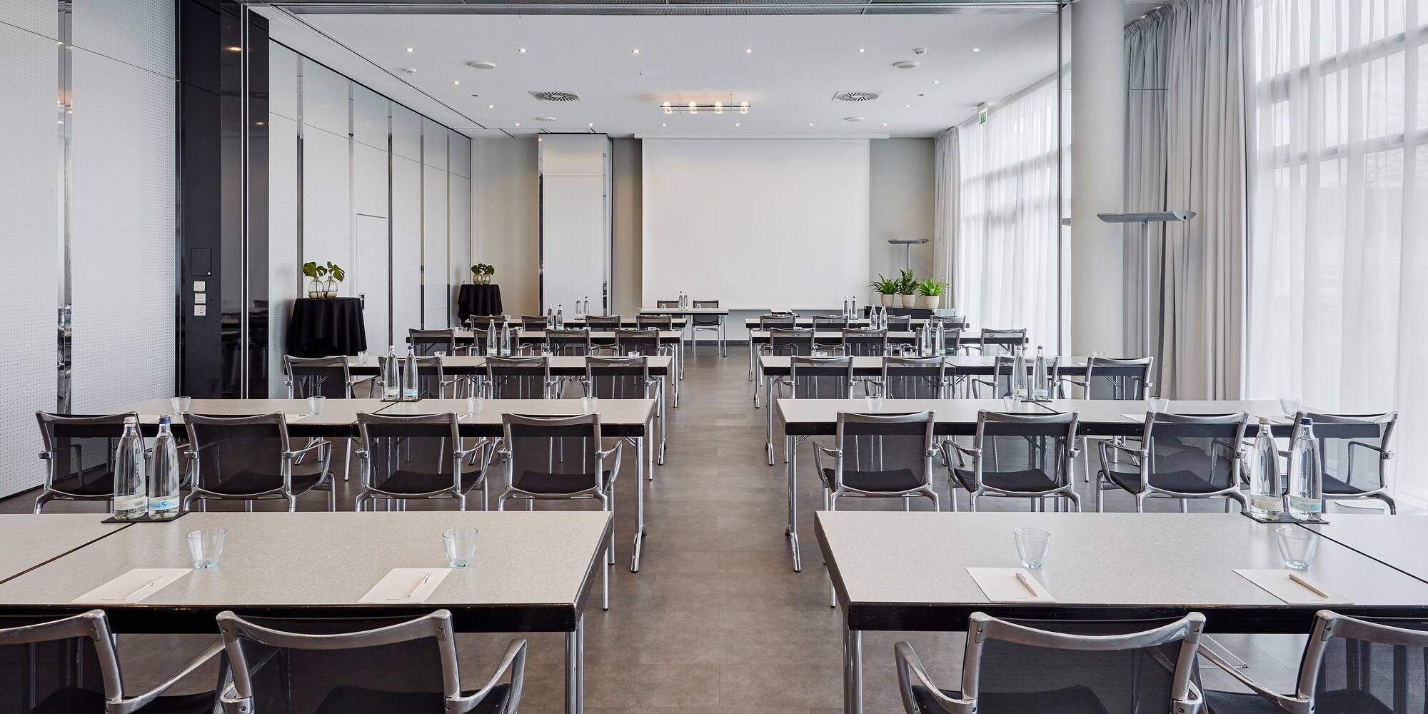 a room with tables and chairs