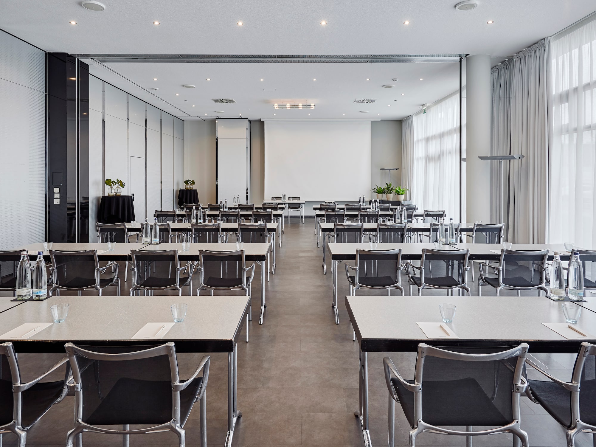 a room with tables and chairs