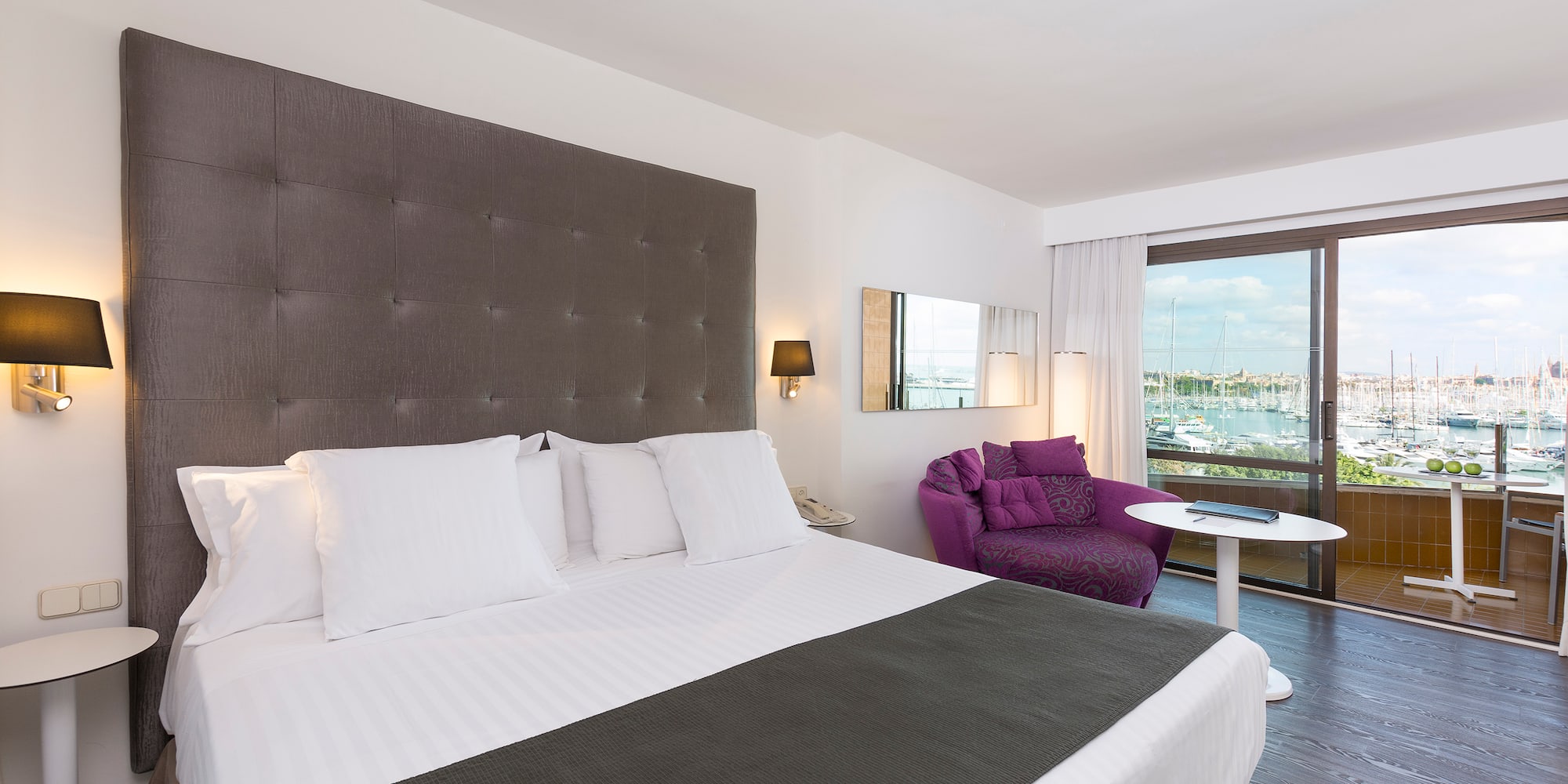 a room with a bed and a chair