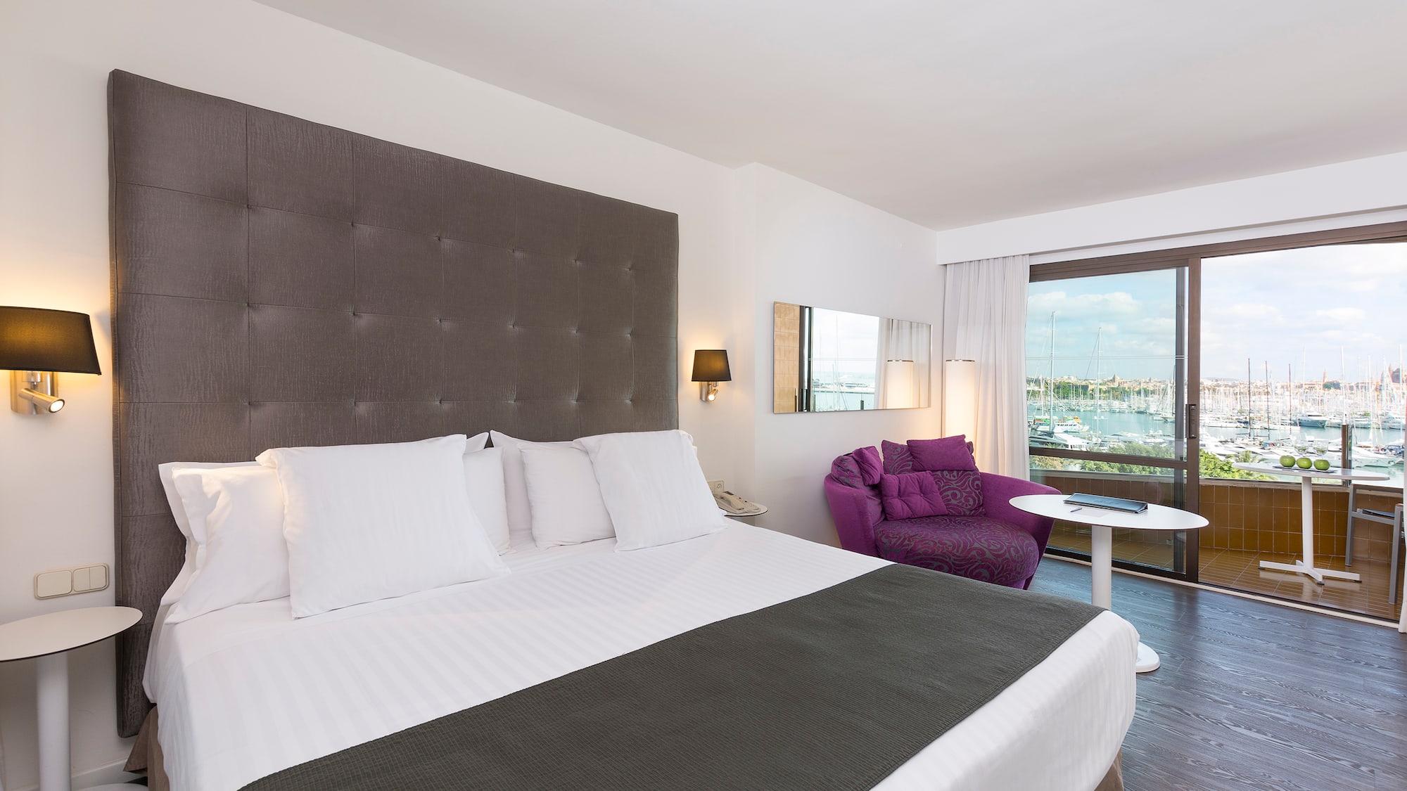 a room with a bed and a chair