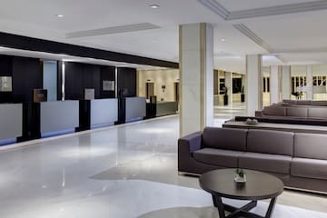 a lobby with couches and tables