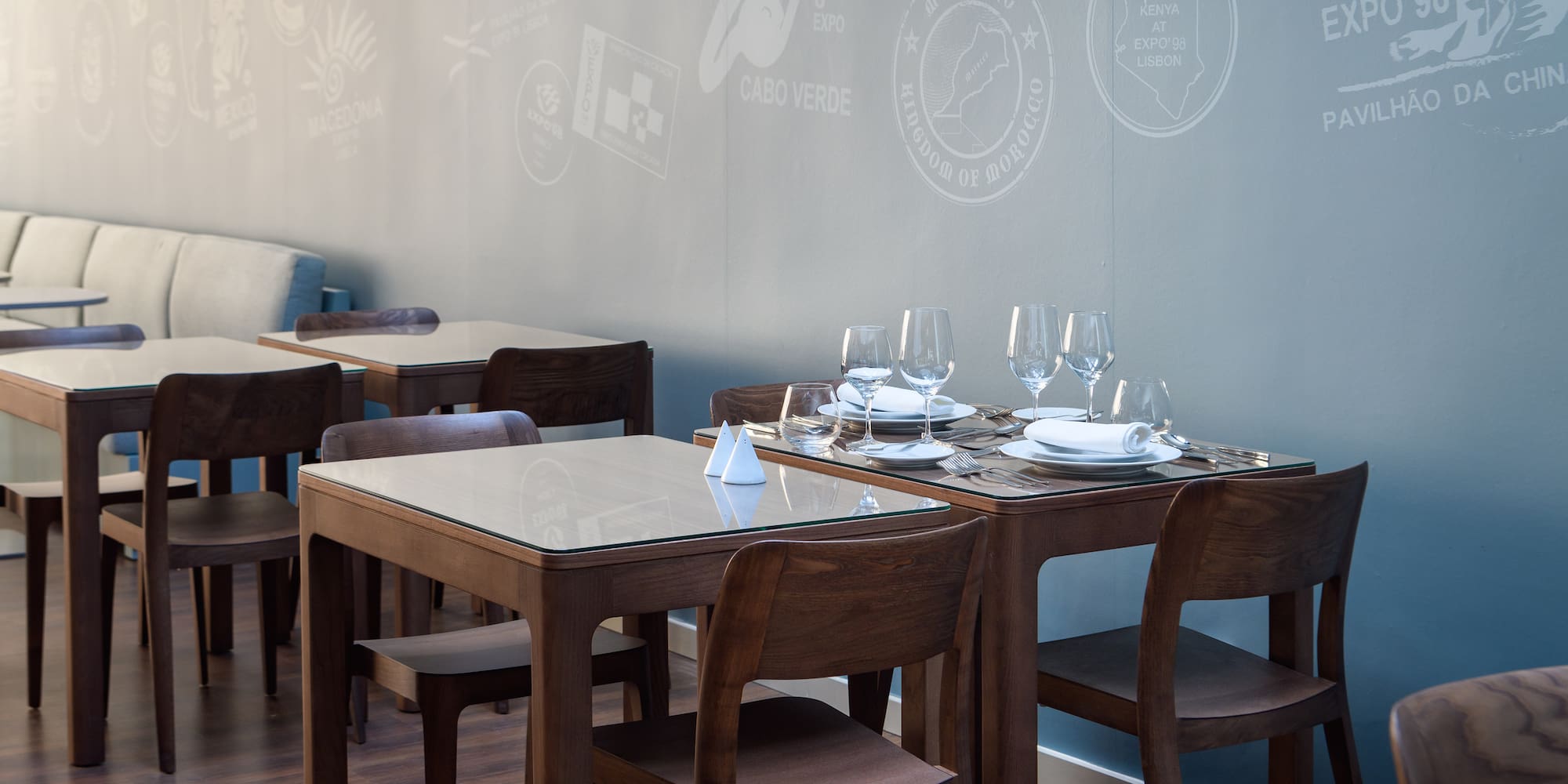 a table with glasses and plates on it