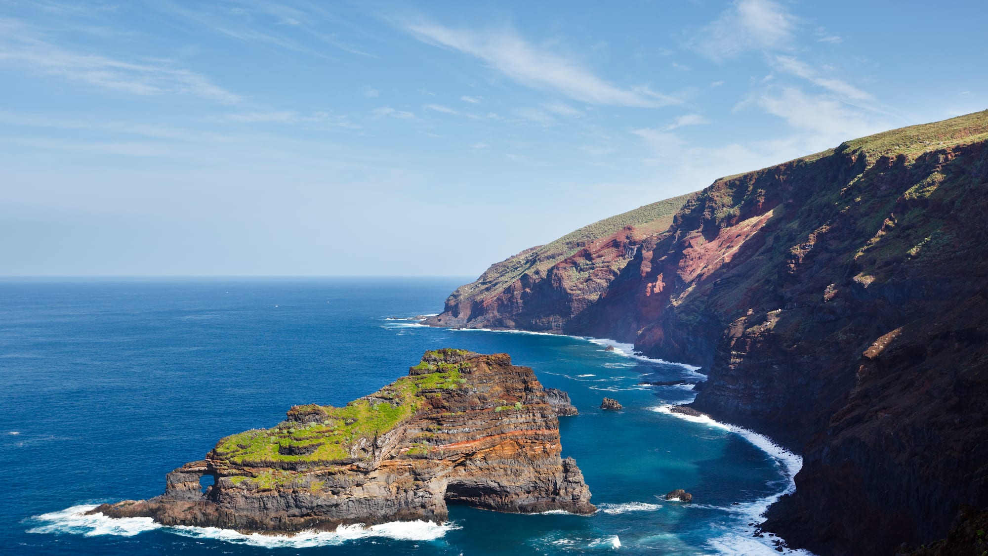 a rocky cliffs and water