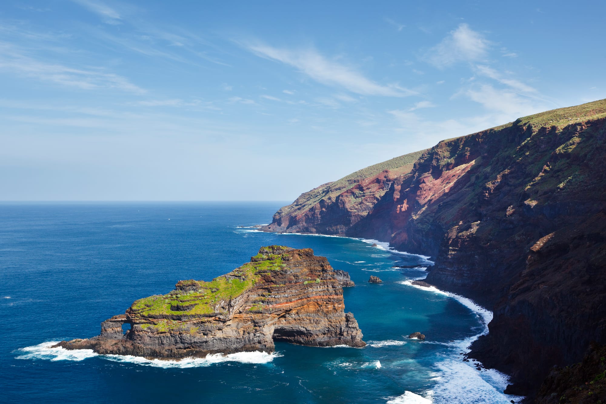 a rocky cliffs and water