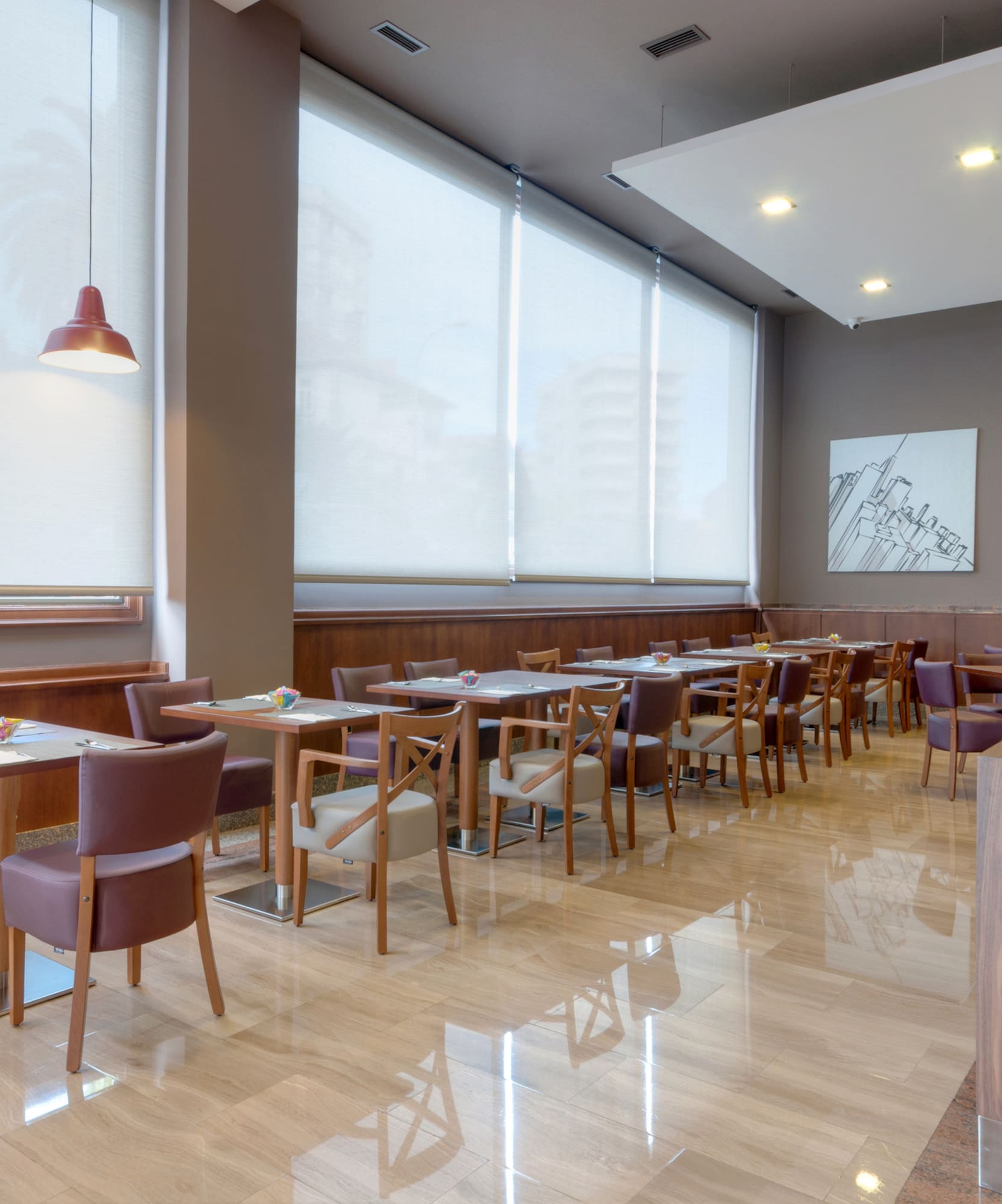 a room with tables and chairs