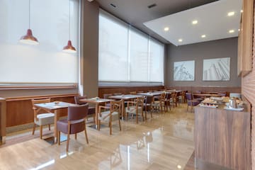 a room with tables and chairs