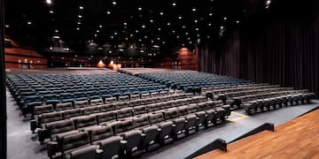 a large auditorium with rows of seats