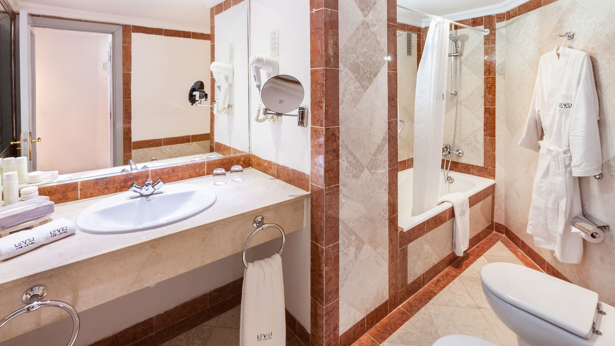 a bathroom with a shower and sink