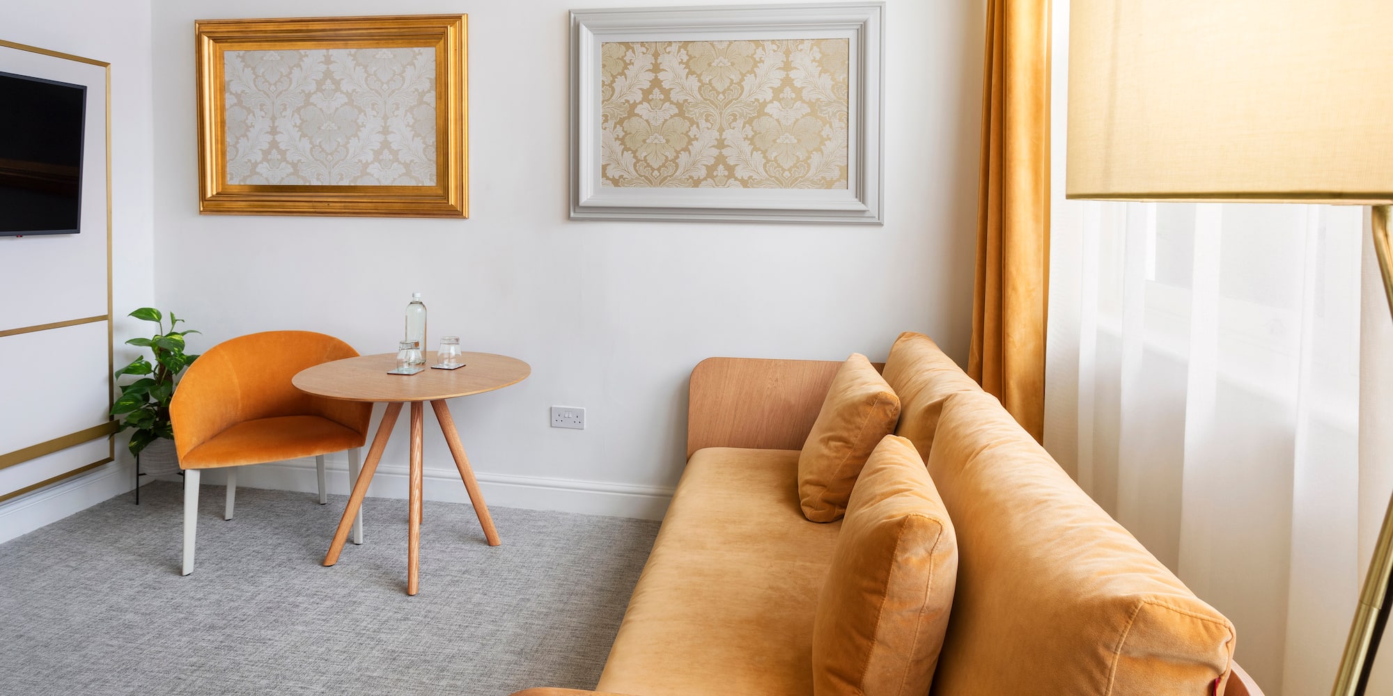 a living room with a couch and a table