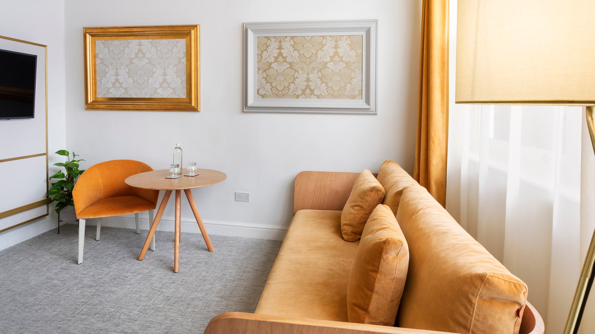 a living room with a couch and a table