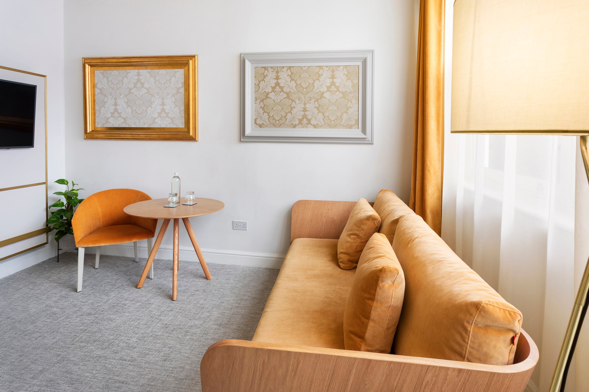 a living room with a couch and a table