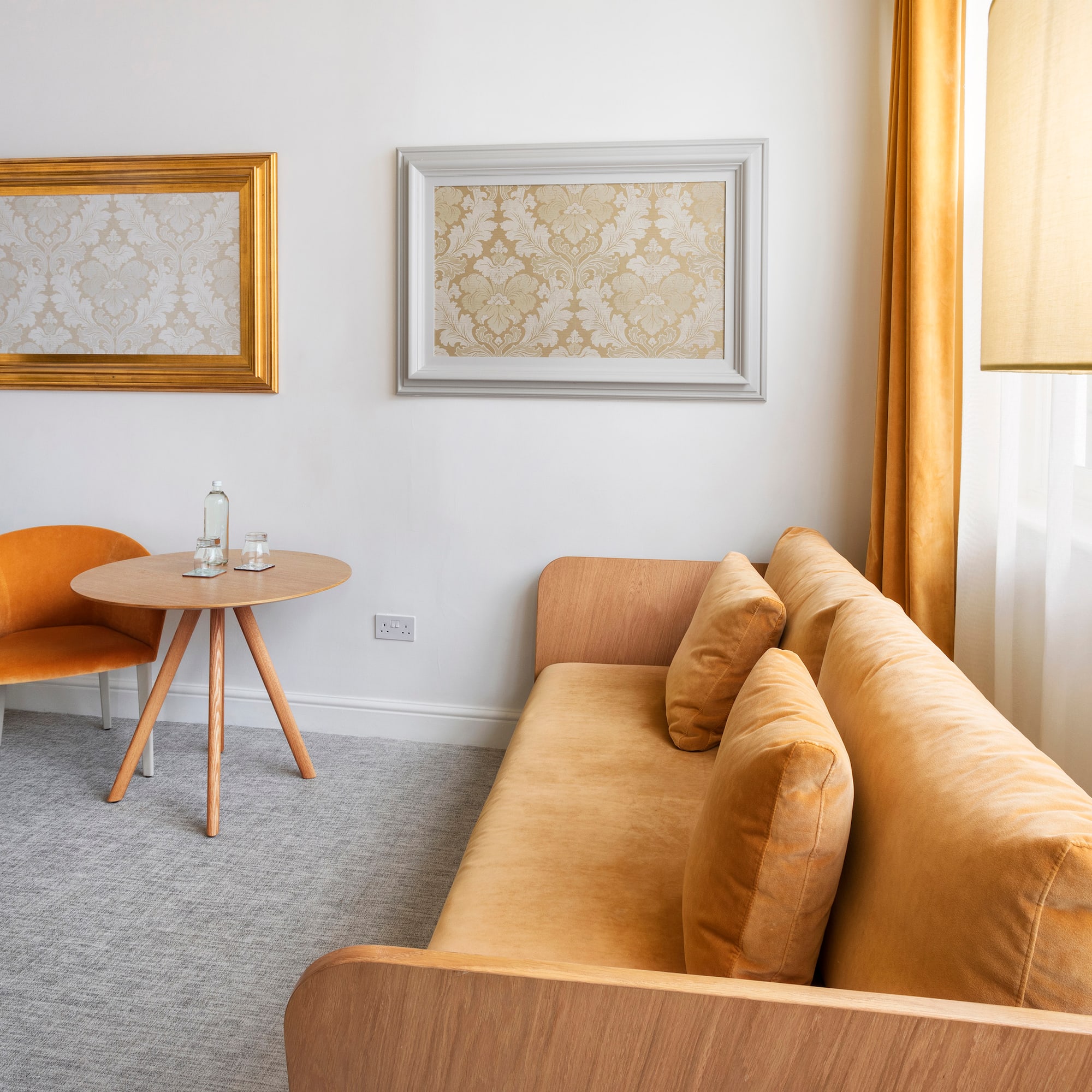 a living room with a couch and a table