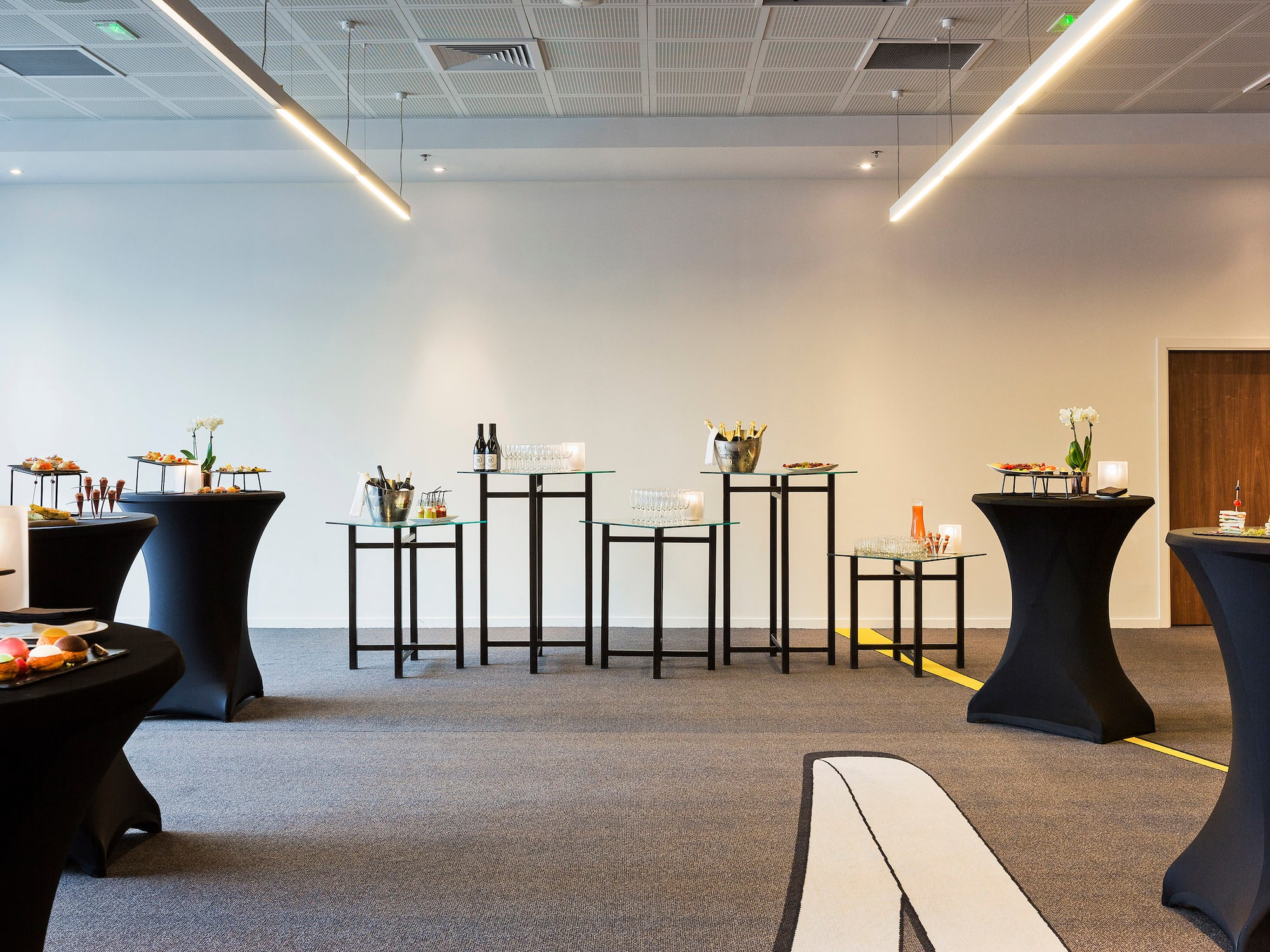 a room with tables and chairs