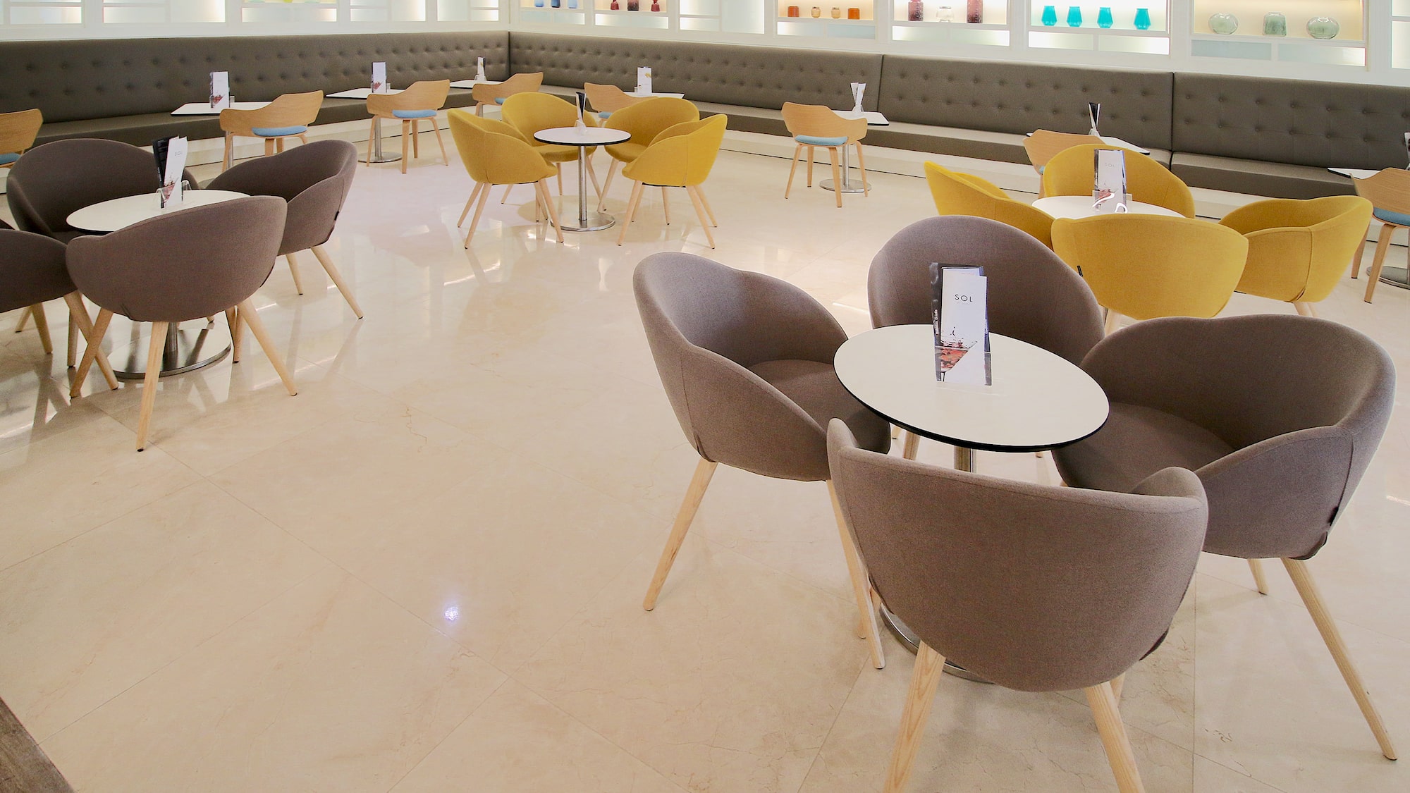 a room with tables and chairs