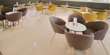 a room with tables and chairs