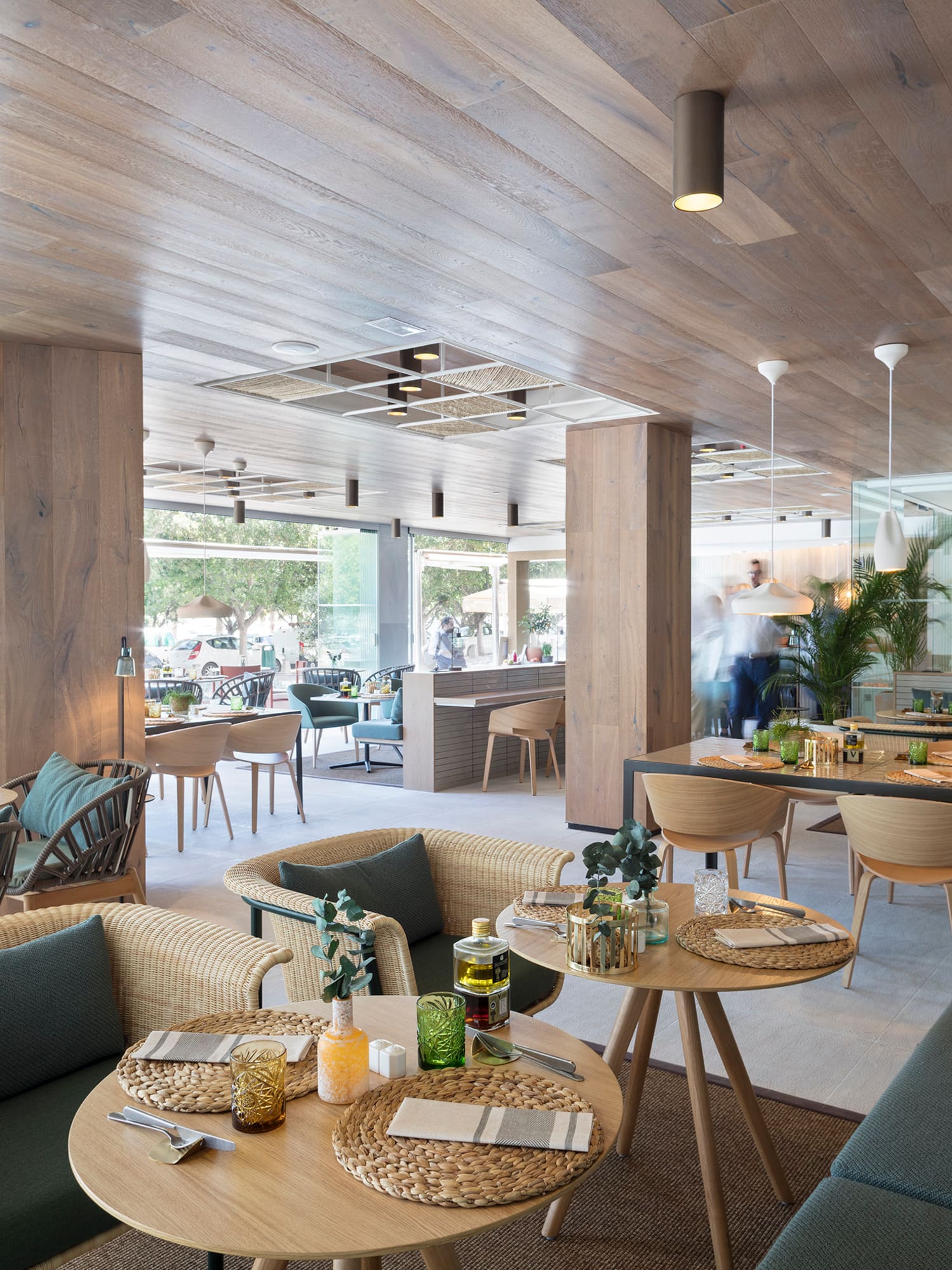 a restaurant with tables and chairs