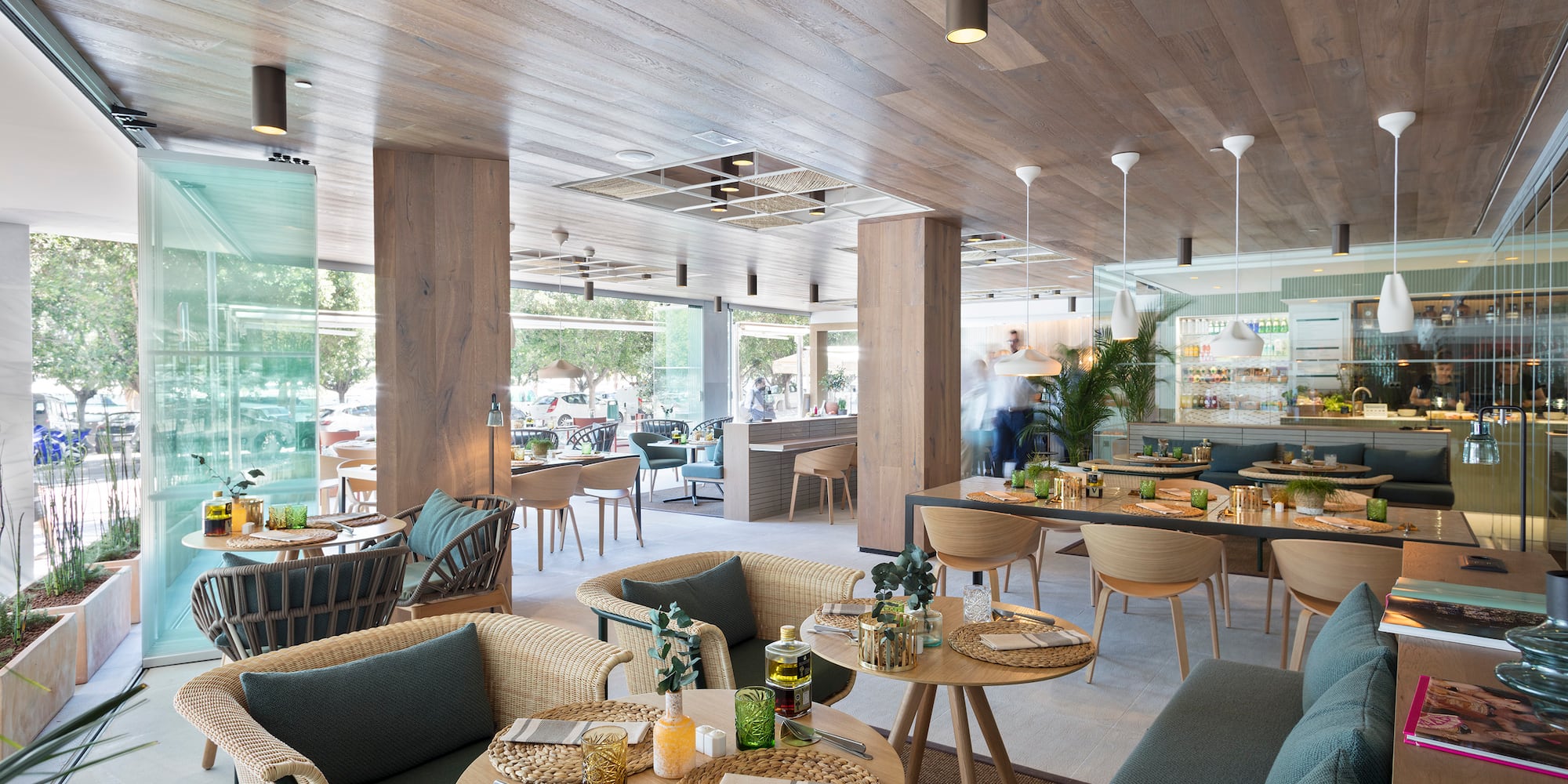 a restaurant with tables and chairs