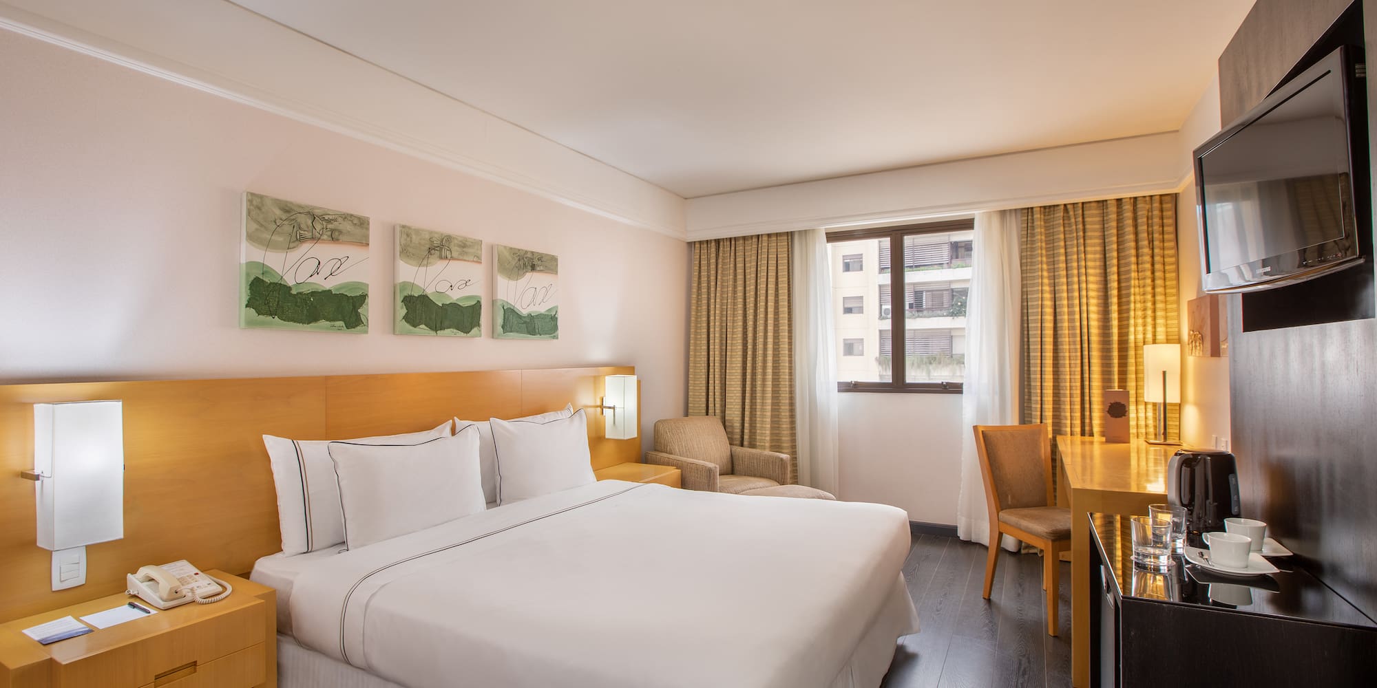 a room with a bed and a desk