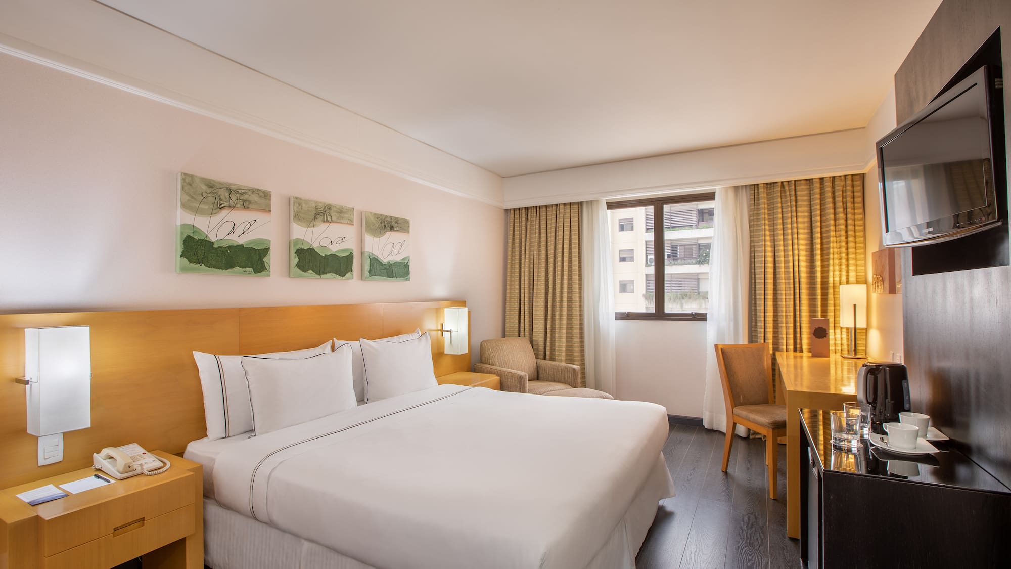 a room with a bed and a desk