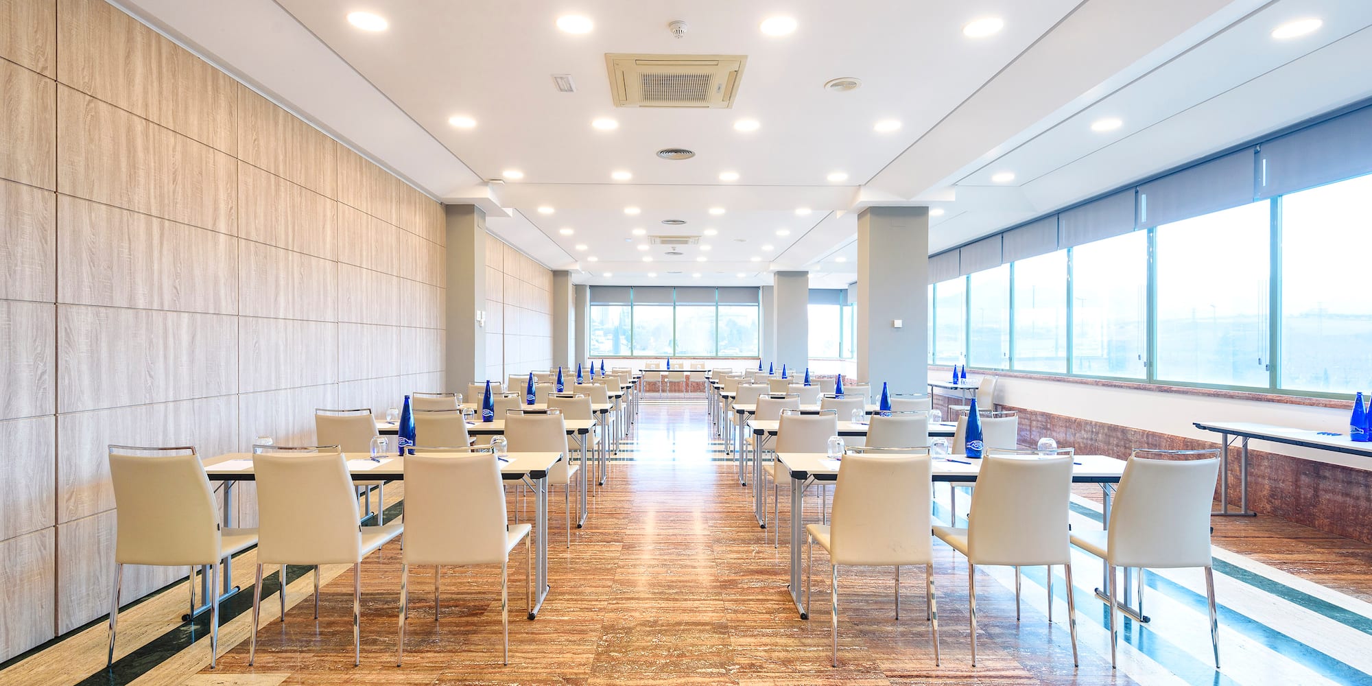 a room with tables and chairs