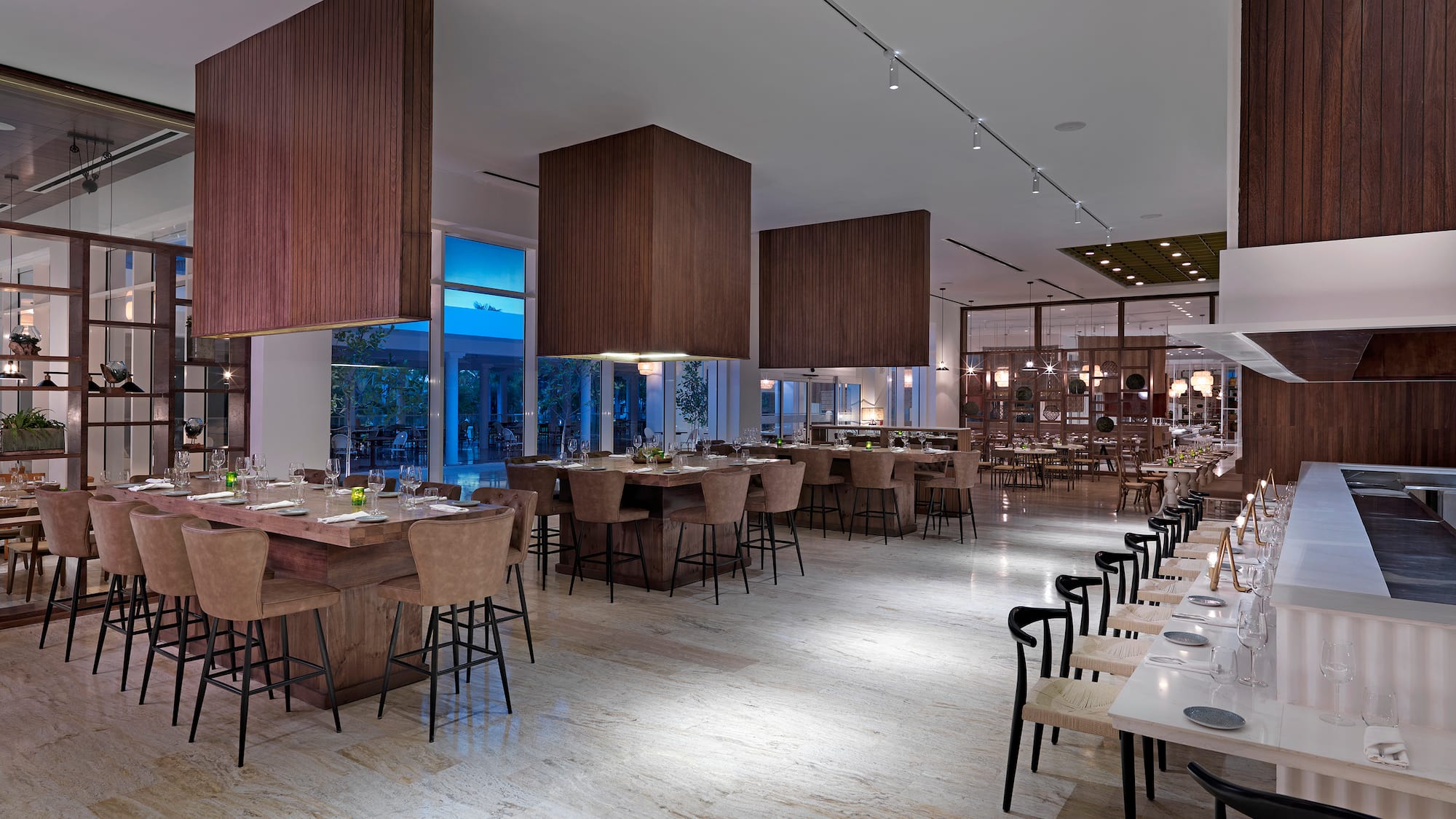 a large room with tables and chairs